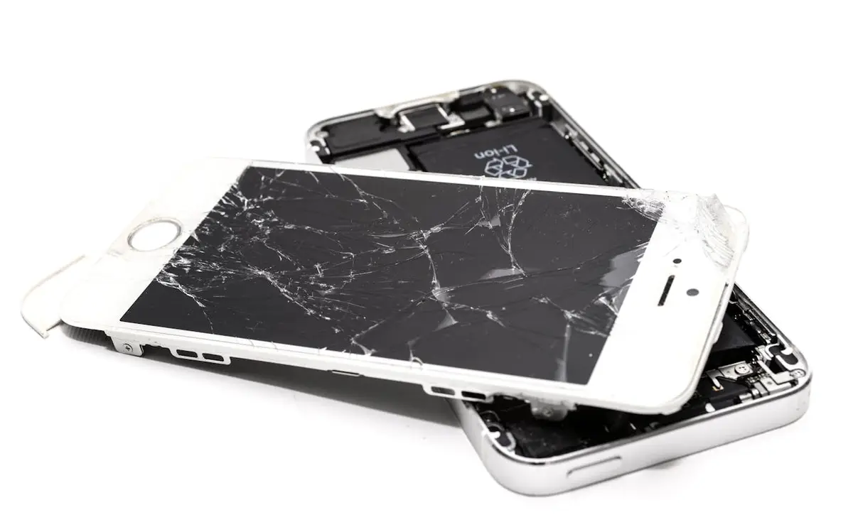 Phone before repair — cracked and shattered screen